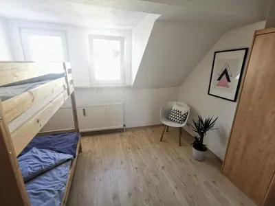 Ein Bett oder Betten in einem Zimmer der Unterkunft Moderne 3BR Netflix,Kaffee,Wifi,Parken