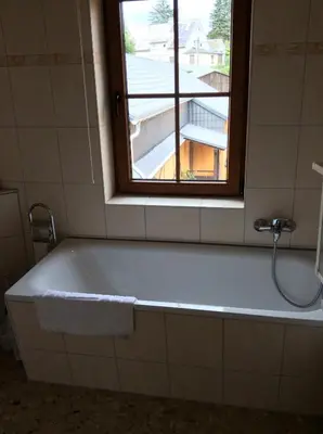 Ein Badezimmer in der Unterkunft Landhotel Quelle