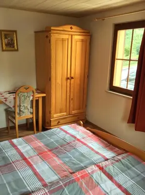 Ein Bett oder Betten in einem Zimmer der Unterkunft Landhotel Quelle