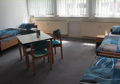 Ein Bett oder Betten in einem Zimmer der Unterkunft Hostel jo-si