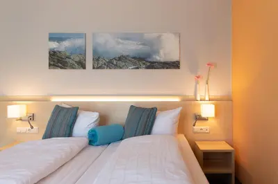 Ein Bett oder Betten in einem Zimmer der Unterkunft Riff Resort
