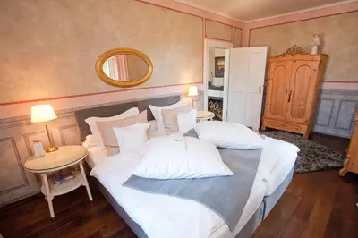 Ein Bett oder Betten in einem Zimmer der Unterkunft Rebenhaus Meißen