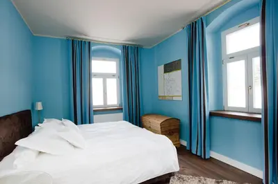 Ein Bett oder Betten in einem Zimmer der Unterkunft Rebenhaus Meißen