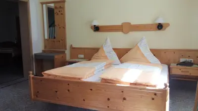 Ein Bett oder Betten in einem Zimmer der Unterkunft Hotel Carola