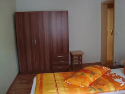Ein Bett oder Betten in einem Zimmer der Unterkunft Ferienwohnung Kriedel