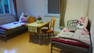 Ein Bett oder Betten in einem Zimmer der Unterkunft Gästewohnung zum Wohlfühlen