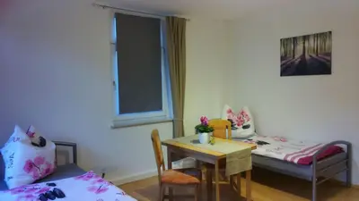 Ein Bett oder Betten in einem Zimmer der Unterkunft Gästewohnung zum Wohlfühlen