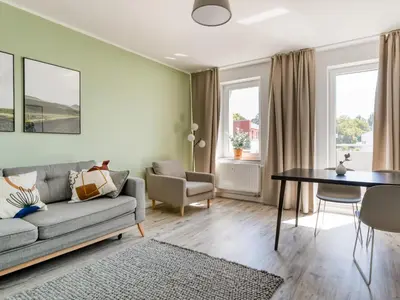 Ein Sitzbereich in der Unterkunft Limehome Chemnitz Hartmannstraße