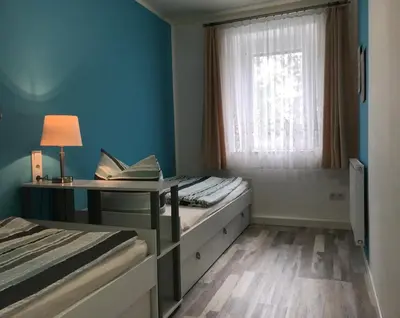 Ein Bett oder Betten in einem Zimmer der Unterkunft Ferienwohnung Horn