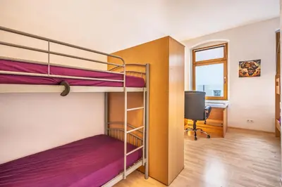 Ein Bett oder Betten in einem Zimmer der Unterkunft Wohnen in 09599 Freiberg