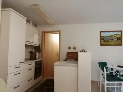 Küche/Küchenzeile in der Unterkunft Haus Königstein FeWo Bielablick