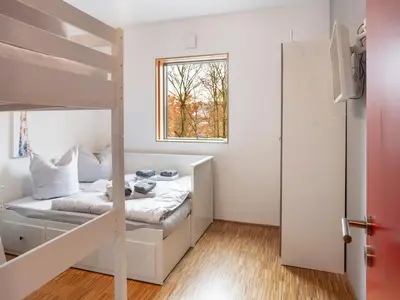 Ein Bett oder Betten in einem Zimmer der Unterkunft Exklusives Ferienhaus in Freital