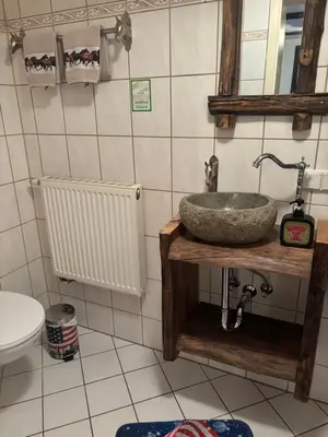 Ein Badezimmer in der Unterkunft Western-Inn