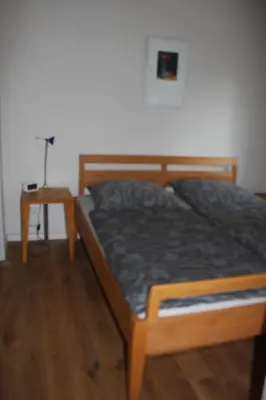 Ein Bett oder Betten in einem Zimmer der Unterkunft Ferienwohnung Goldgrund15