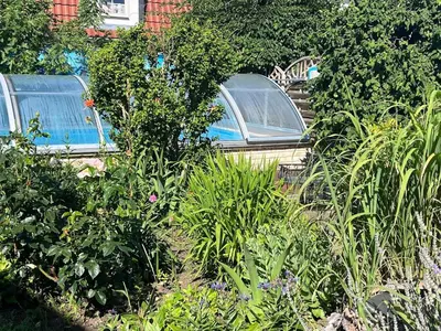 Ein Garten an der Unterkunft Ferienwohnung Heyne