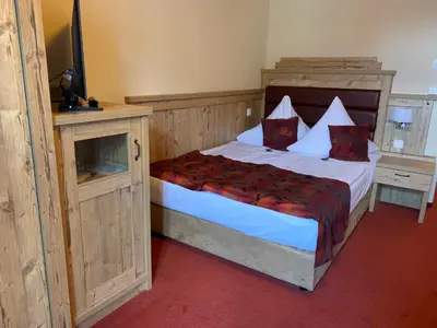 Ein Bett oder Betten in einem Zimmer der Unterkunft Hotel Goldner Löwe