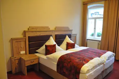 Ein Bett oder Betten in einem Zimmer der Unterkunft Hotel Goldner Löwe