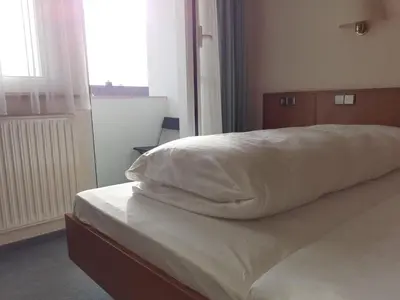Ein Bett oder Betten in einem Zimmer der Unterkunft Edit Pension Rossau