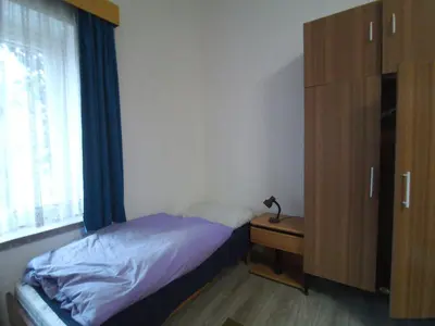 Ein Bett oder Betten in einem Zimmer der Unterkunft LINDENHOF WALDHEIM