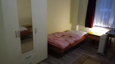 Ein Bett oder Betten in einem Zimmer der Unterkunft LINDENHOF WALDHEIM
