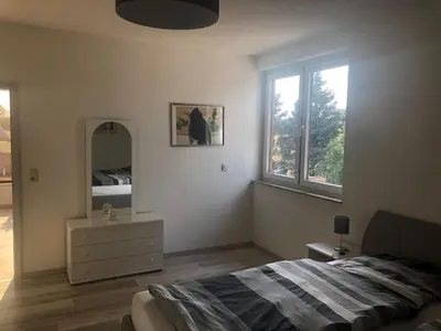 Ein Bett oder Betten in einem Zimmer der Unterkunft Ferienwohnung Friese