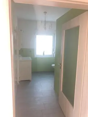 Ein Bett oder Betten in einem Zimmer der Unterkunft Ferienwohnung Friese
