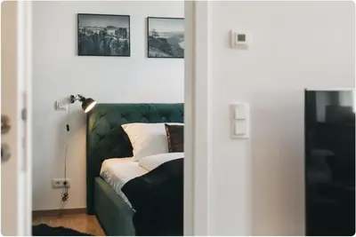 Ein Bett oder Betten in einem Zimmer der Unterkunft TIP! Zentraler geht's nicht! Premium Apartment in der Altstadt