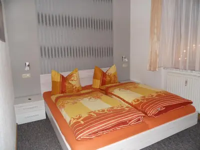 Ein Bett oder Betten in einem Zimmer der Unterkunft Ferienwohnung Einenkel