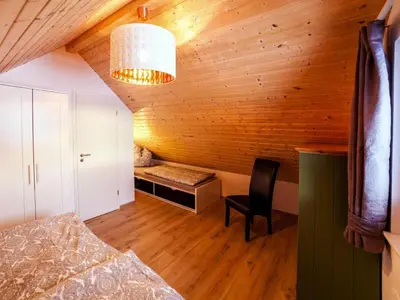 Ein Bett oder Betten in einem Zimmer der Unterkunft Ferienhaus am Partwitzer See, Elsterheide