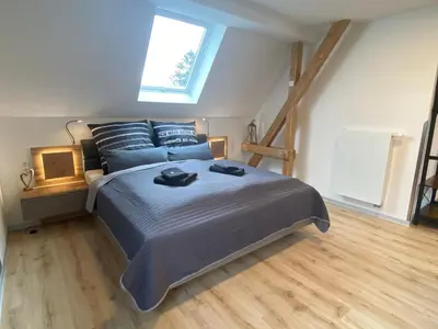 Ein Bett oder Betten in einem Zimmer der Unterkunft my inn