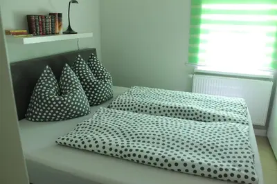 Ein Bett oder Betten in einem Zimmer der Unterkunft Ferienoase Kleine Perle