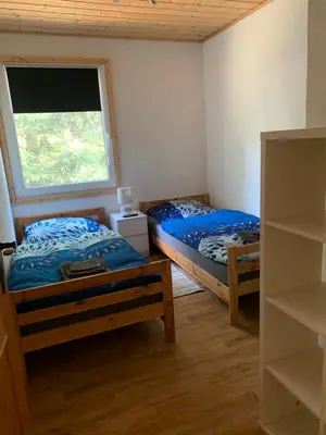 Ein Bett oder Betten in einem Zimmer der Unterkunft Pension Lausa