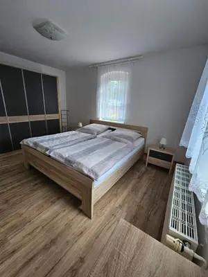 Ein Bett oder Betten in einem Zimmer der Unterkunft Ferienwohnung Karlguth