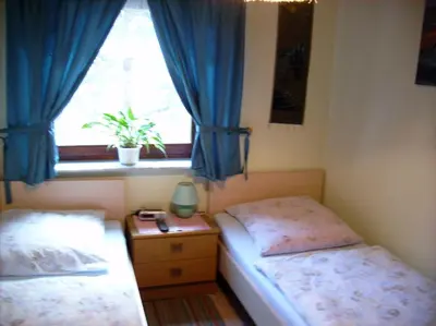 Ein Bett oder Betten in einem Zimmer der Unterkunft Dresden, Fewo Huhle
