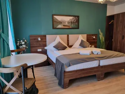 Ein Bett oder Betten in einem Zimmer der Unterkunft A&F Hotel Chemnitz