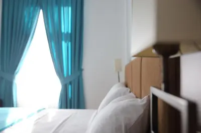 Ein Bett oder Betten in einem Zimmer der Unterkunft A&F Hotel Chemnitz