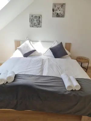 Ein Bett oder Betten in einem Zimmer der Unterkunft A&F Hotel Chemnitz