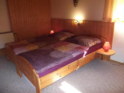 Ein Bett oder Betten in einem Zimmer der Unterkunft Ferienwohnung Erzgebirge - Pobershau - mit schönem Ausblick, ruhige, beste Lage