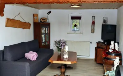 Ein Sitzbereich in der Unterkunft Ferienwohnung Sonnenaufgang