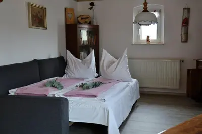 Ein Sitzbereich in der Unterkunft Ferienwohnung Sonnenaufgang
