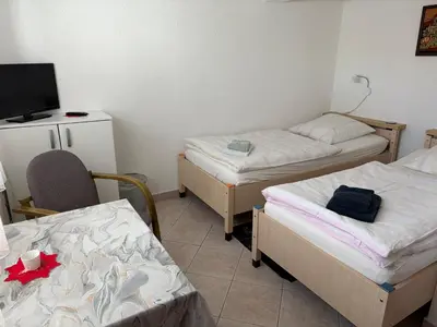 Ein Bett oder Betten in einem Zimmer der Unterkunft Zimmervermietung Lippmann