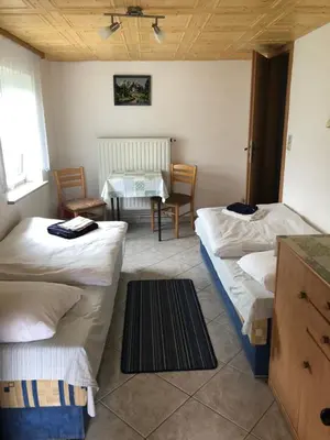 Ein Bett oder Betten in einem Zimmer der Unterkunft Zimmervermietung Lippmann