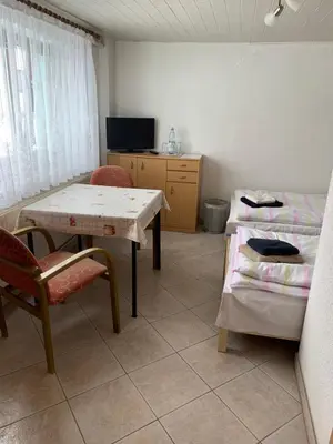 Ein Bett oder Betten in einem Zimmer der Unterkunft Zimmervermietung Lippmann