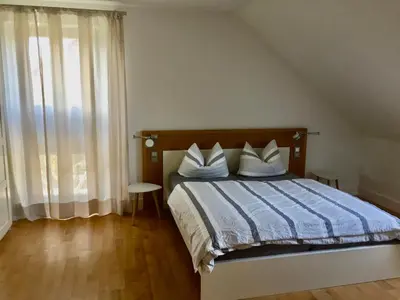 Ein Bett oder Betten in einem Zimmer der Unterkunft Ferienwohnung Trede