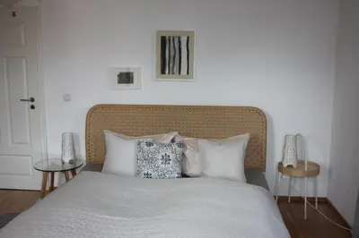 Ein Bett oder Betten in einem Zimmer der Unterkunft Traumhafte Etagenwohnung in Günderzeitvilla