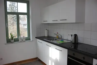Küche/Küchenzeile in der Unterkunft Traumhafte Etagenwohnung in Günderzeitvilla