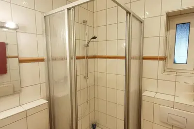 Ein Badezimmer in der Unterkunft Campus Apartment Alexander