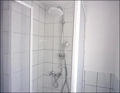 Ein Badezimmer in der Unterkunft Ferienwohnung Kohrener Land