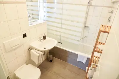 Ein Badezimmer in der Unterkunft City Flair