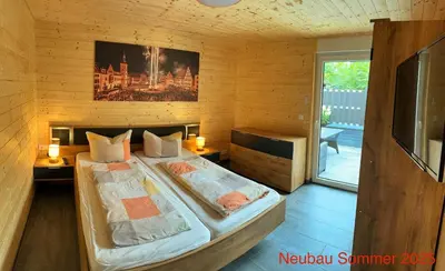 Ein Bett oder Betten in einem Zimmer der Unterkunft Ferienhaus am Goldbach